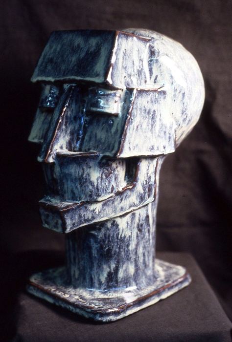 Glazed ceramic sculpture of a cubist, segmented human head